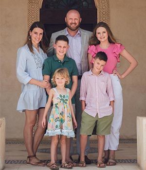 Andrew and his family in Bahrain.