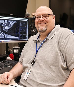 JD Ruud at his work station in Tulsa, OK